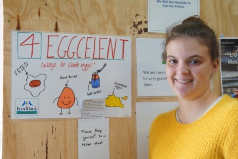 Young volunteer Merryn Hamilton with her egg recipe poster